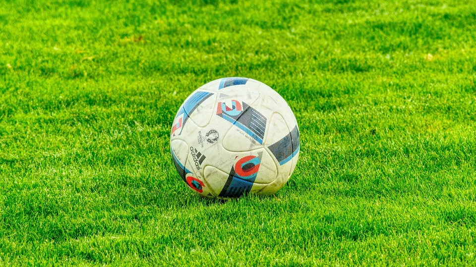 A football on the grass