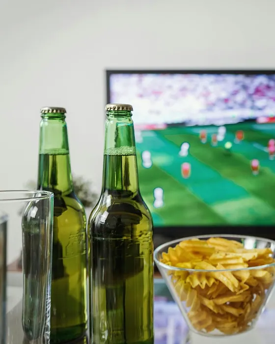 Watching a match on the TV at home